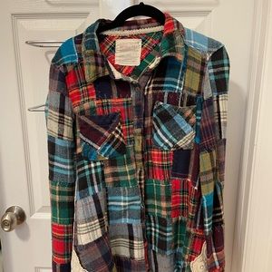 We The Free woman’s plaid flannel button down shirt in like new condition.